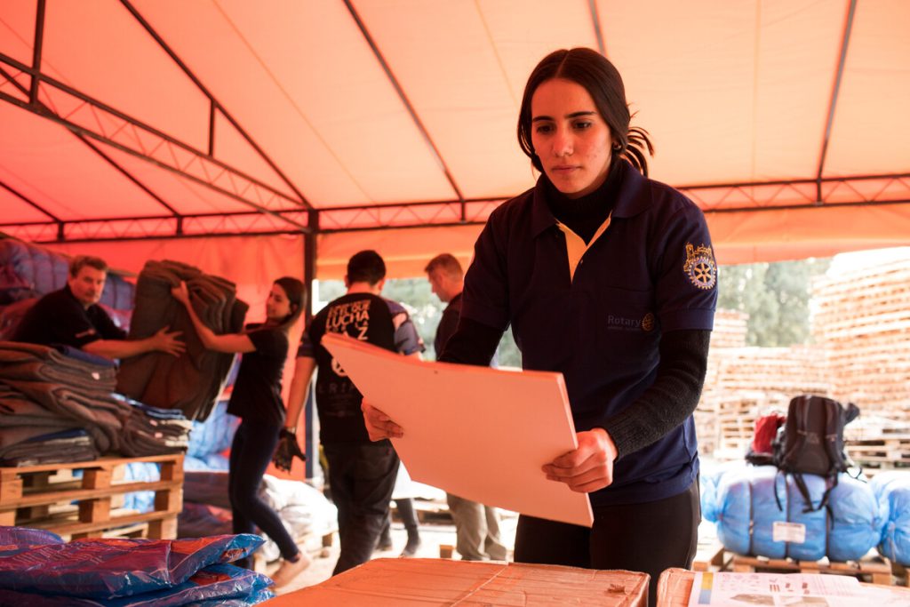Woman sorting aid in Paraguay