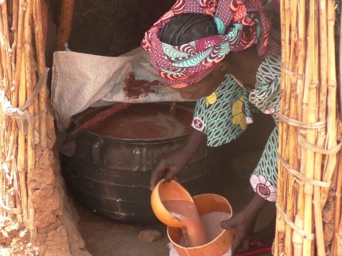 Woman making wine