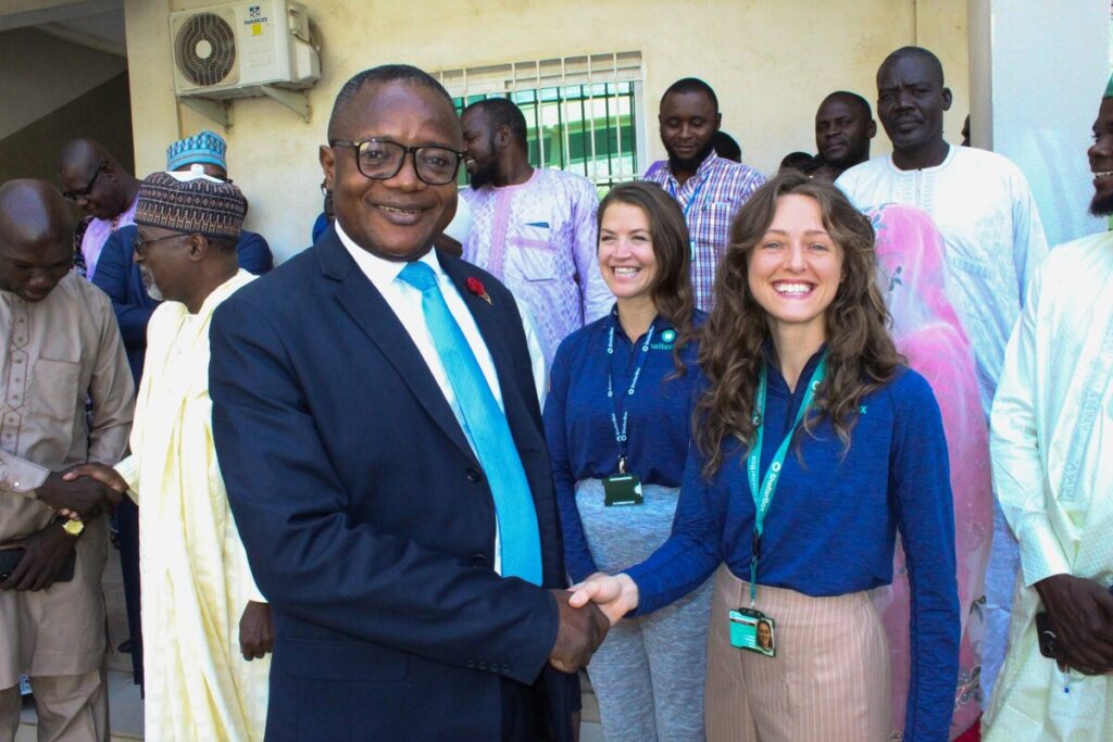 Man and woman shaking hands in Cameroon