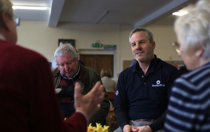 Group of people sitting and talking
