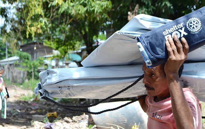 Man carrying aid in Honduras